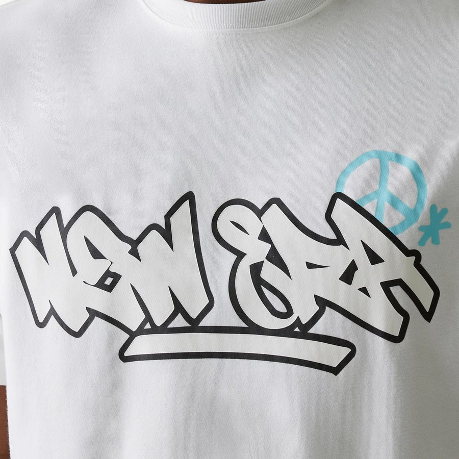 The Male model is wearing New Era Peace Symbol White T-Shirt 3