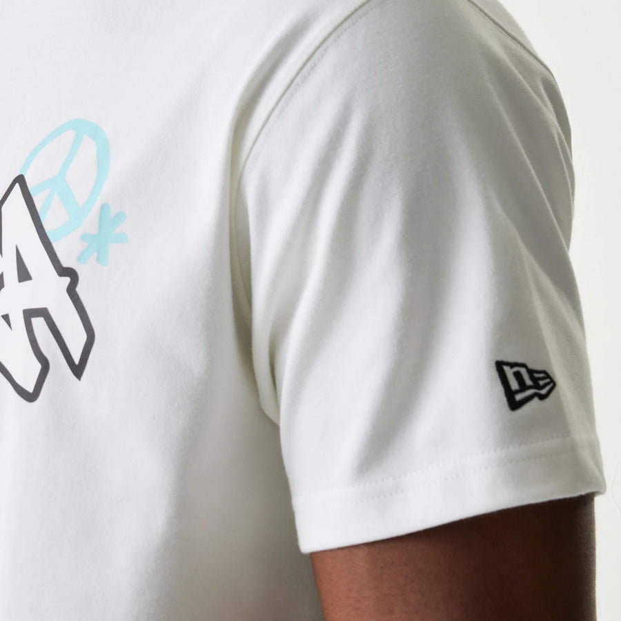 The Male model is wearing New Era Peace Symbol White T-Shirt 6