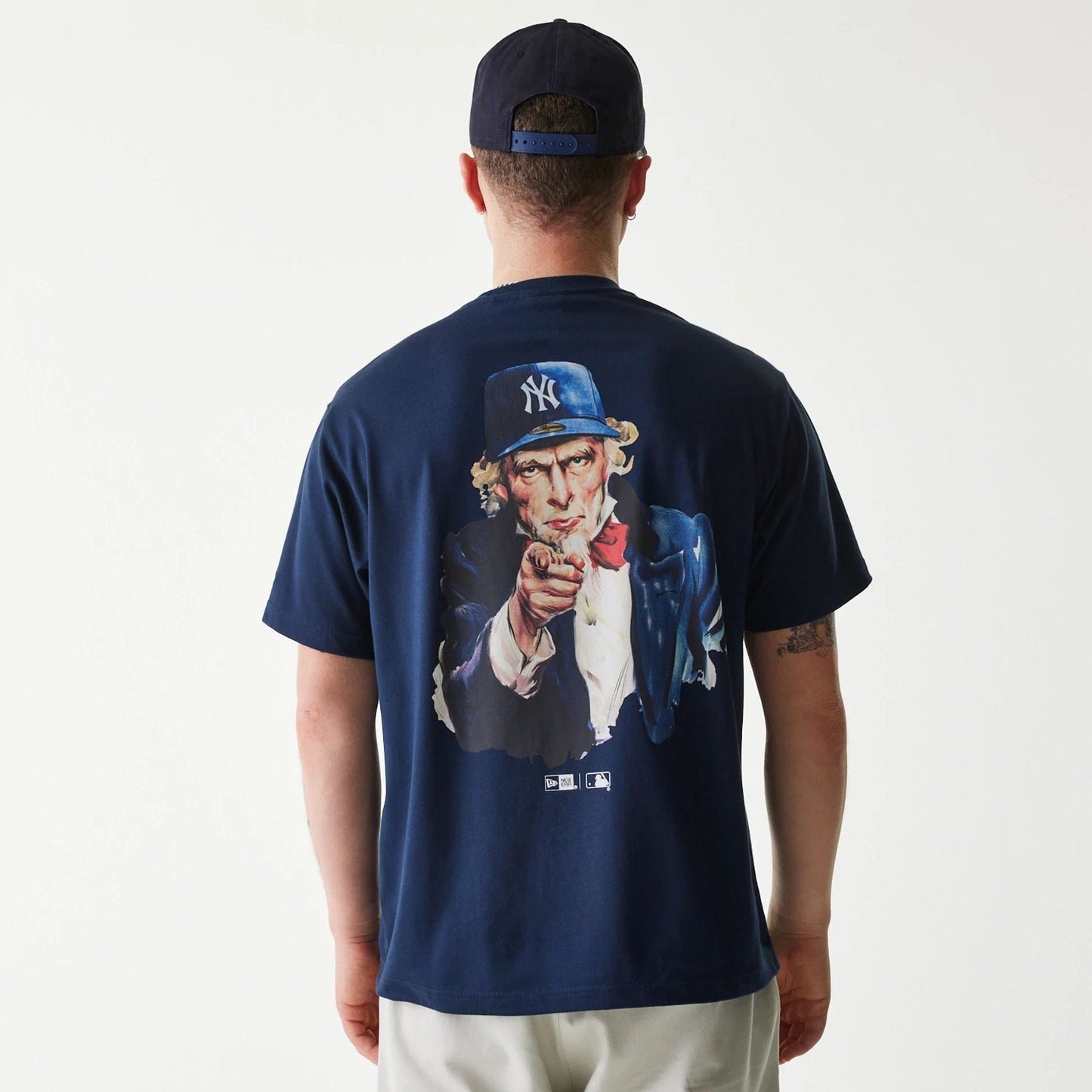 The Male model is wearing New York Yankees MLB Uncle Sam Navy T-Shirt 2