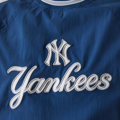 The Male model is wearing New York Yankees MLB Navy U Neck Pullover Windbreaker 4