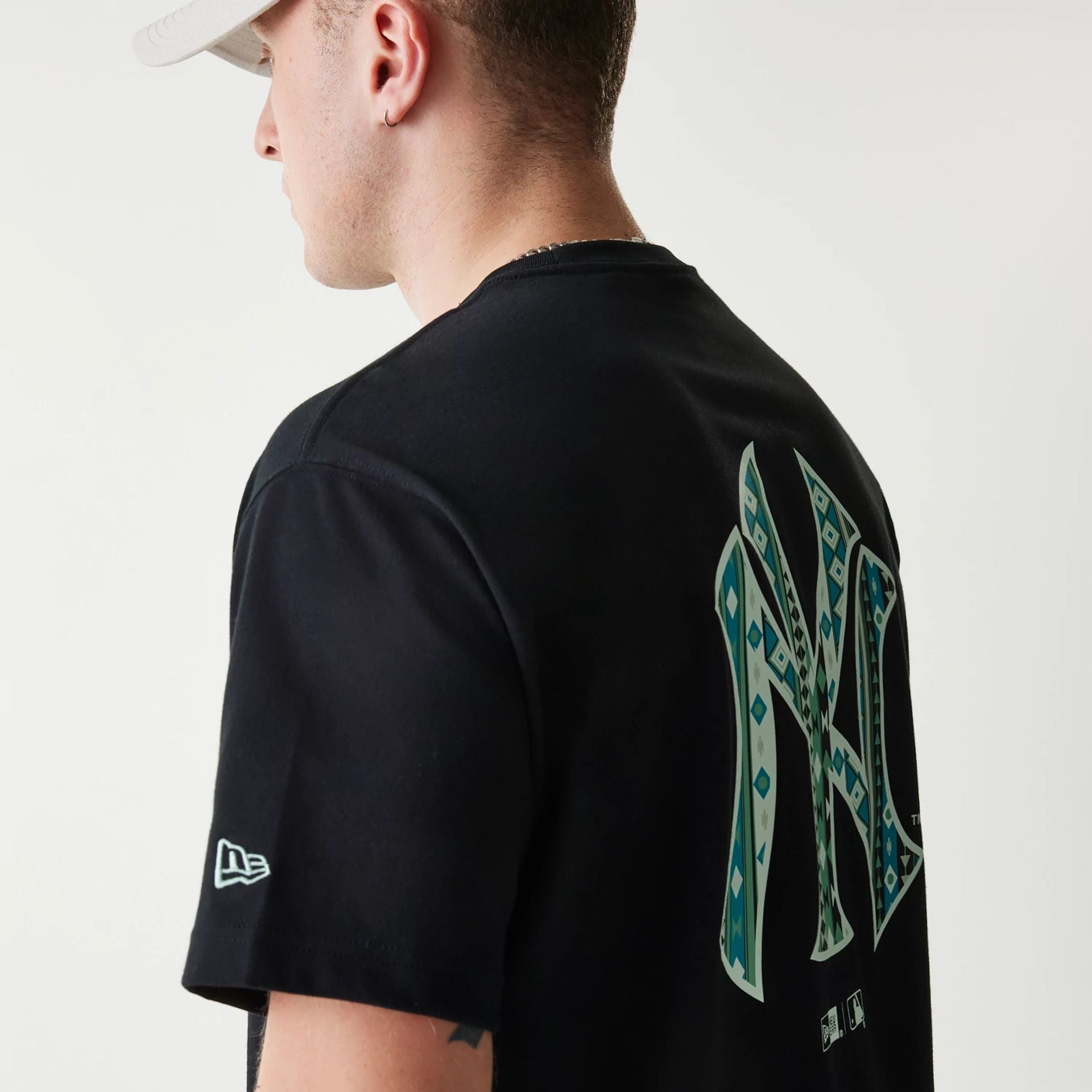 The Male model is wearing New York Yankees MLB Navajo Pattern Black T-Shirt 7