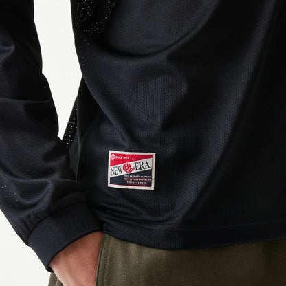 The Male model is wearing New Era Mesh Water Black Long Sleeve T-Shirt 5