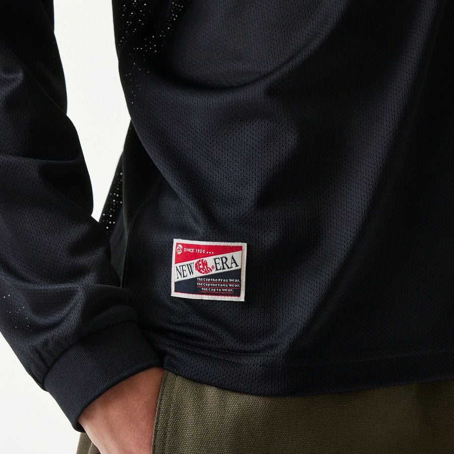 The Male model is wearing New Era Mesh Water Black Long Sleeve T-Shirt 5