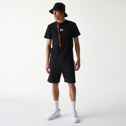 The Male model is wearing New Era Japan Woven Black Shorts 7