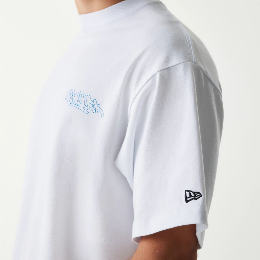 The Male model is wearing New Era Japan Tagging Logo White T-Shirt 3