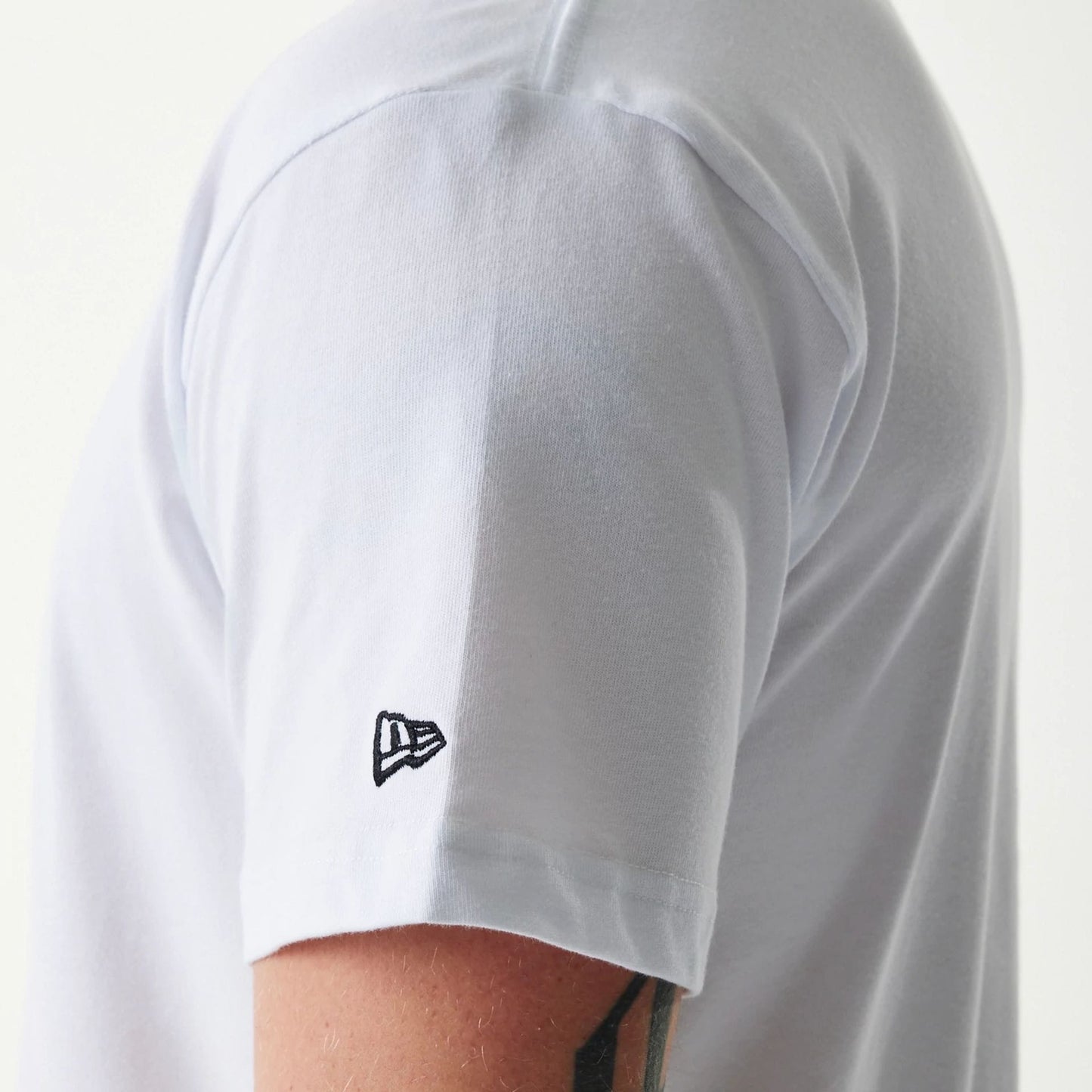 The Male model is wearing New Era Japan Mini Flag Logo White T-Shirt 3