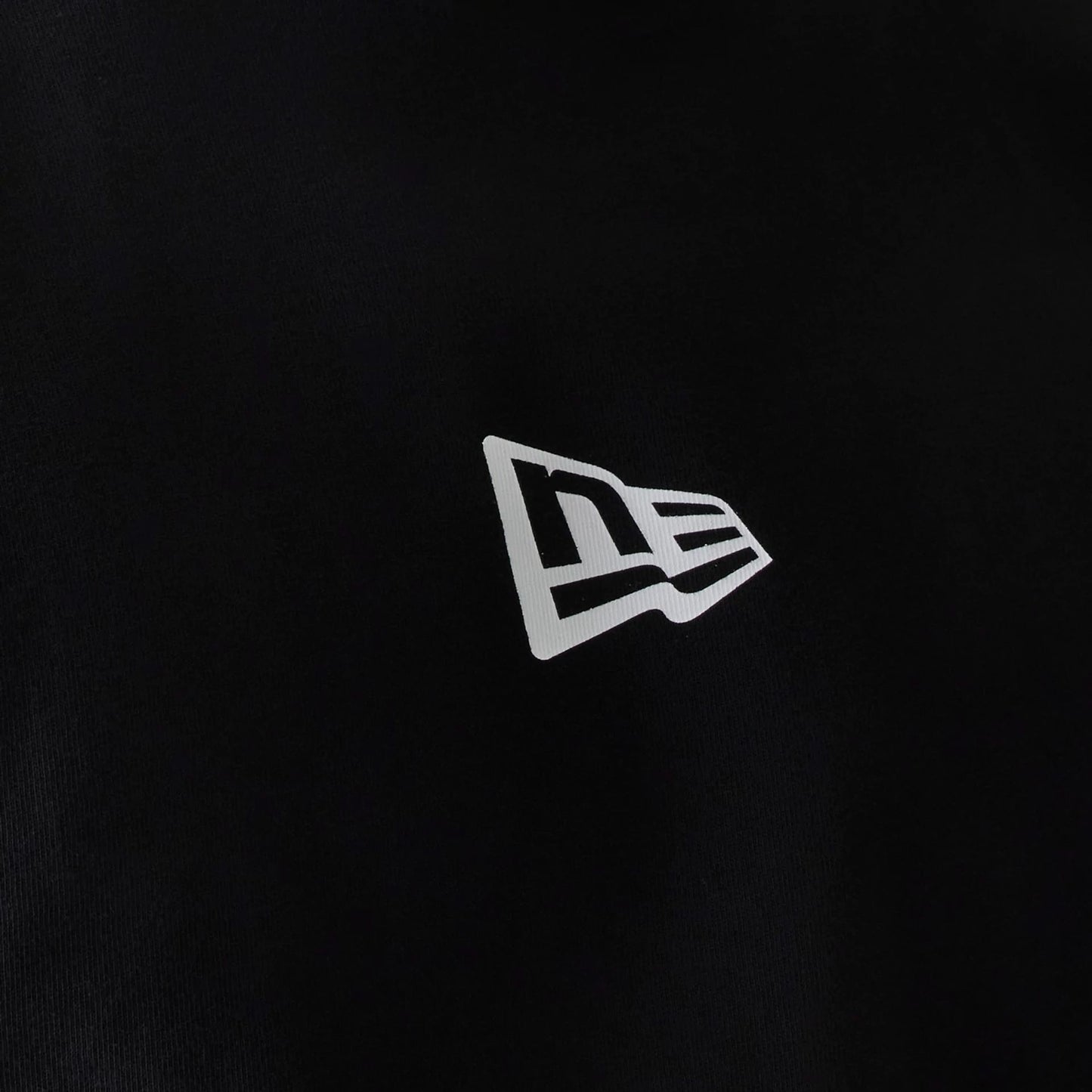 The Male model is wearing New Era Japan Mini Flag Logo Black T-Shirt 4