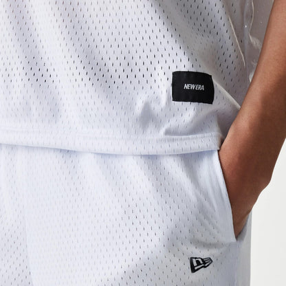 The Male model is wearing New Era Japan Mesh White Sleeveless T-Shirt 4