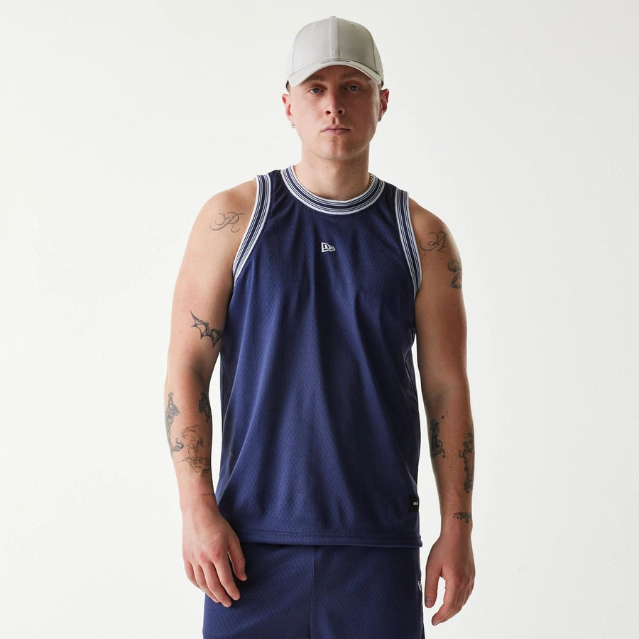 The Male model is wearing New Era Japan Mesh Navy Sleeveless T-Shirt 1