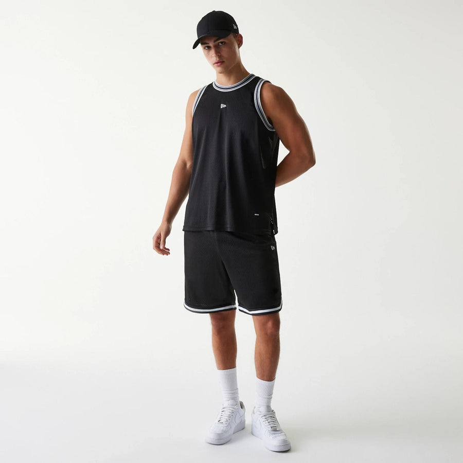 The Male model is wearing New Era Japan Mesh Black Sleeveless T-Shirt 7