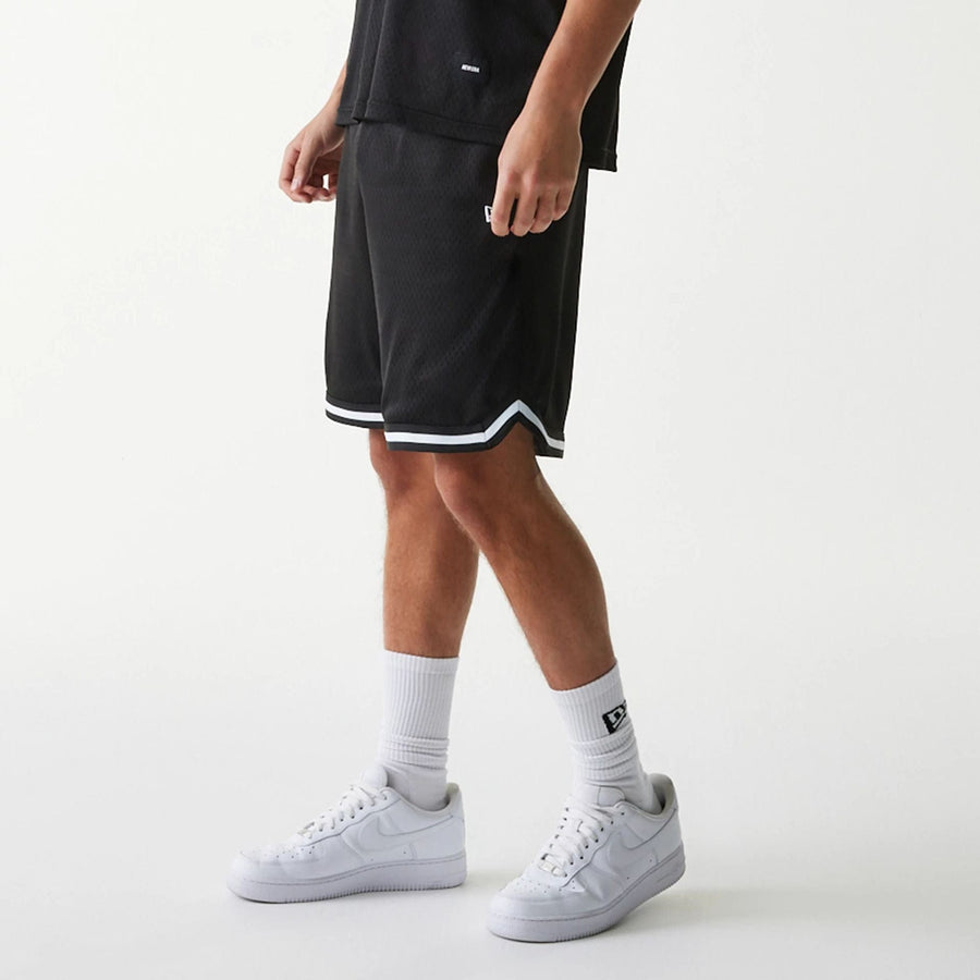 The Male model is wearing New Era Japan Mesh Black Shorts 7