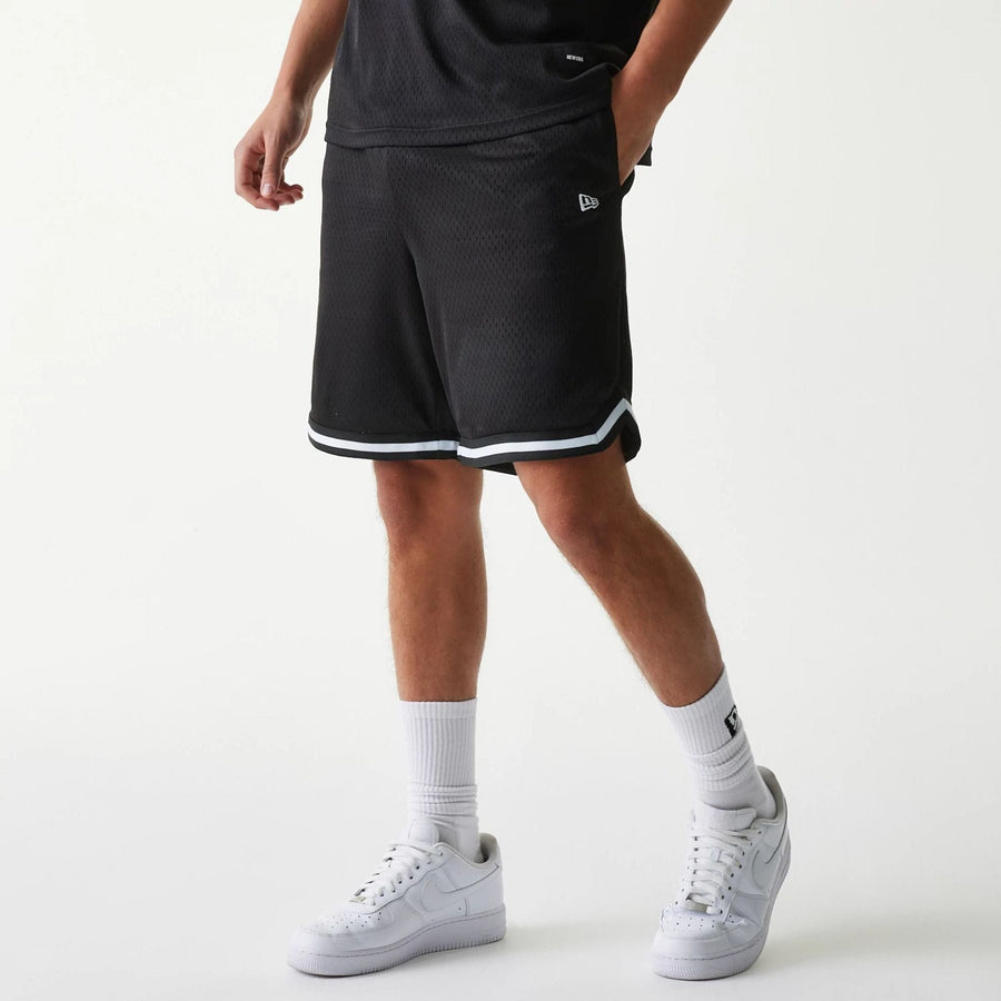 The Male model is wearing New Era Japan Mesh Black Shorts 1