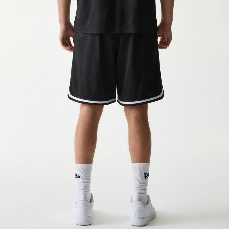 The Male model is wearing New Era Japan Mesh Black Shorts 2