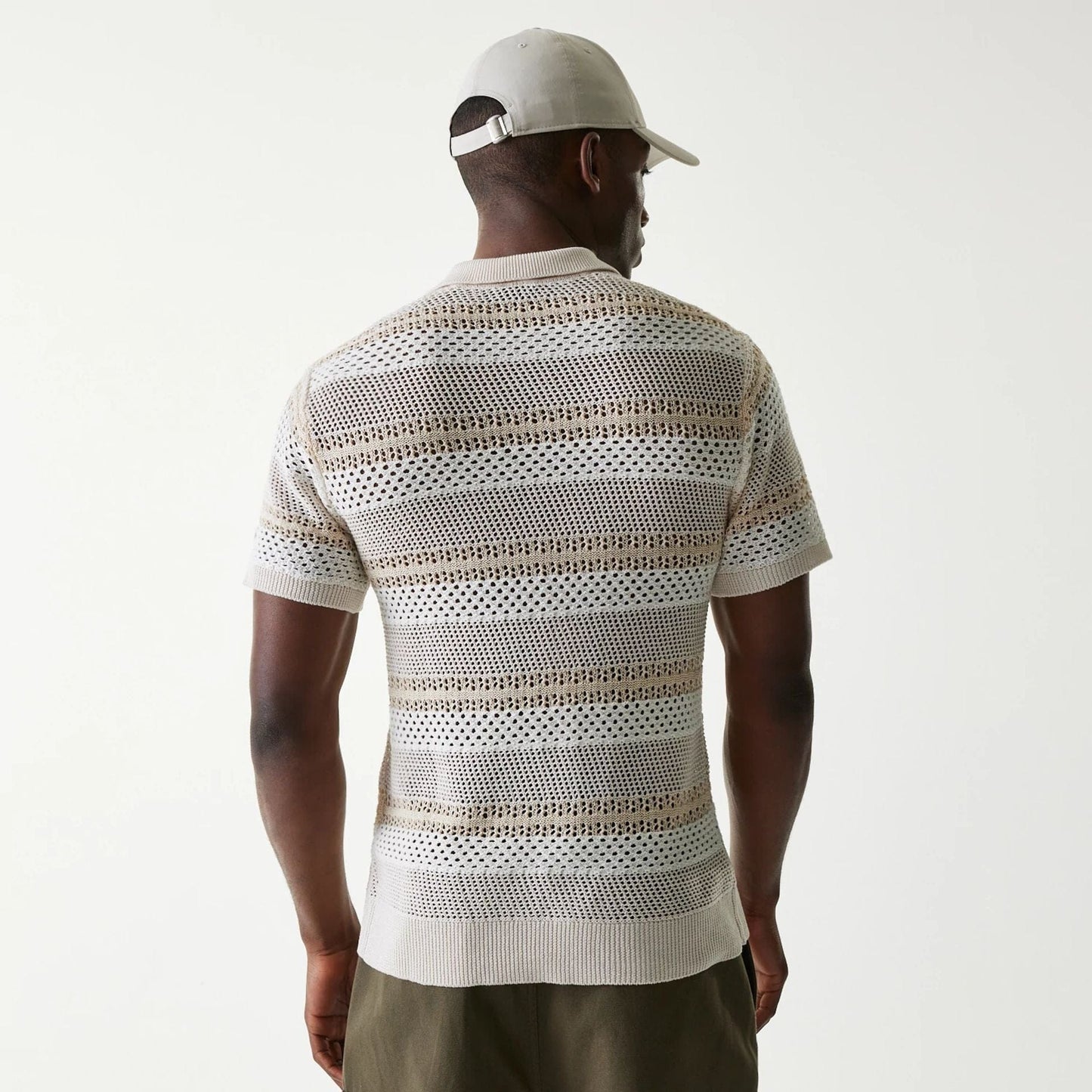 The Male model is wearing New Era Japan Mesh White Polo T-Shirt 2