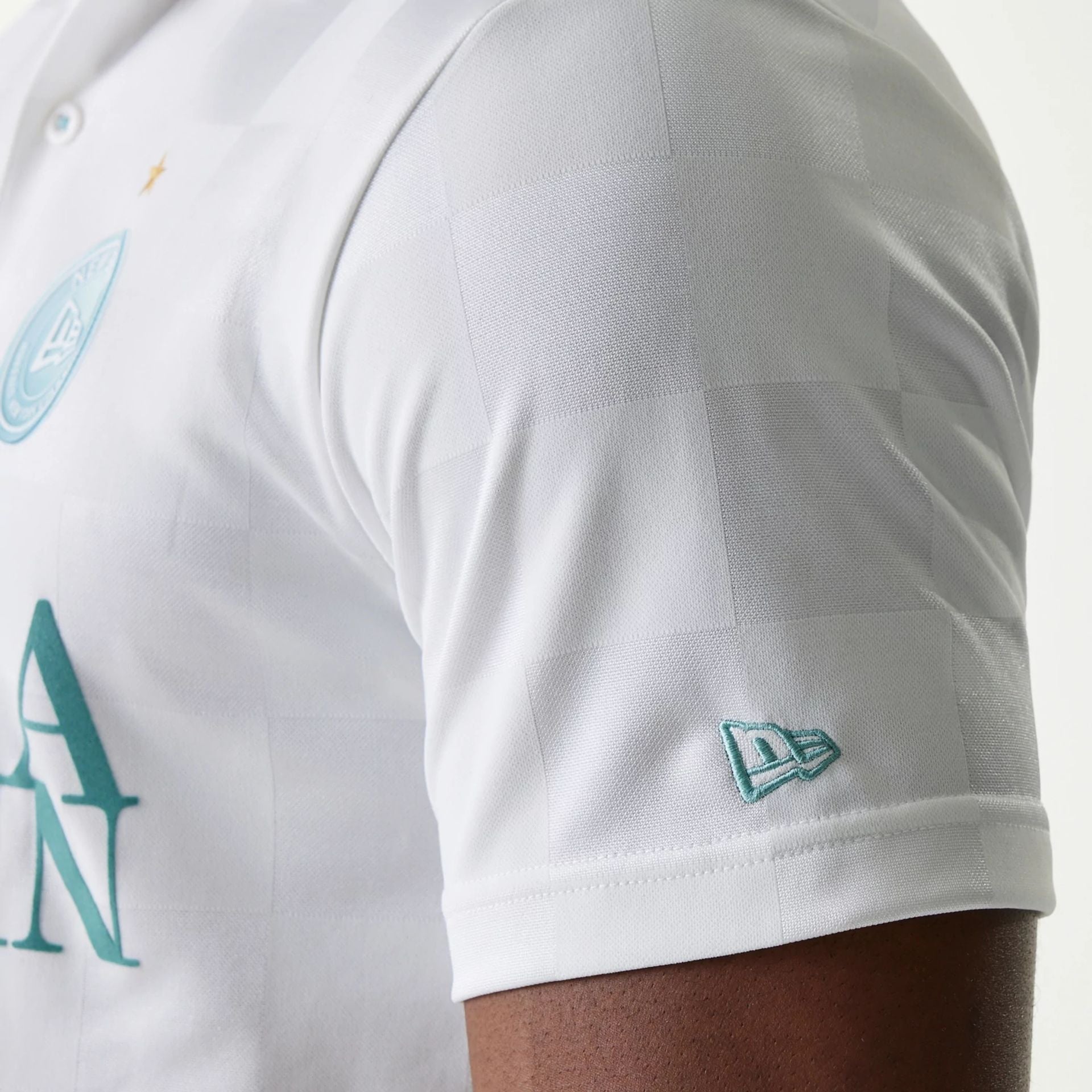 The Male model is wearing New Era Japan Grid White Polo T-Shirt 3