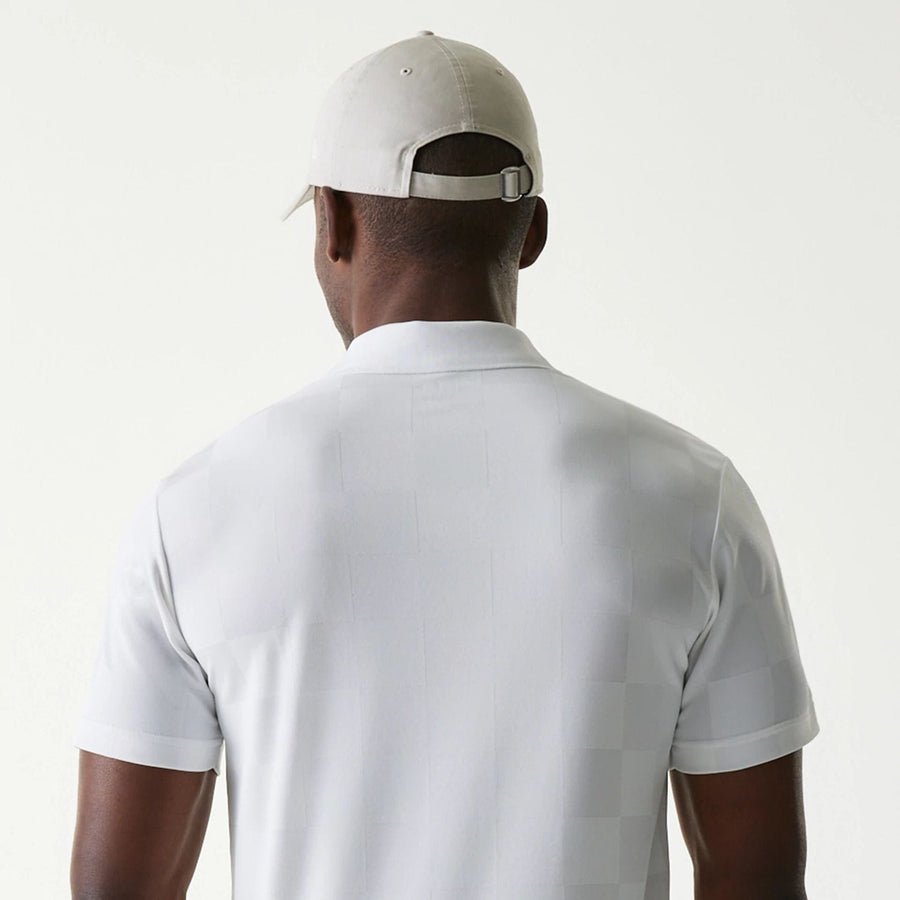 The Male model is wearing New Era Japan Grid White Polo T-Shirt 5
