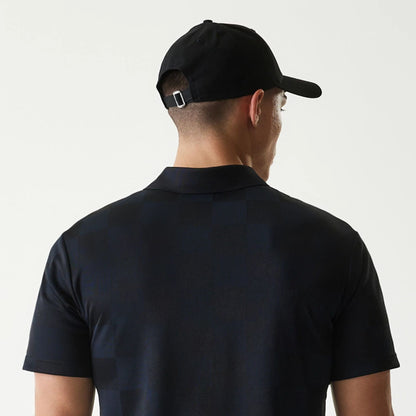 The Male model is wearing New Era Japan Grid Black Polo T-Shirt 5