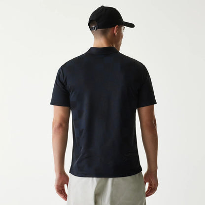 The Male model is wearing New Era Japan Grid Black Polo T-Shirt 2