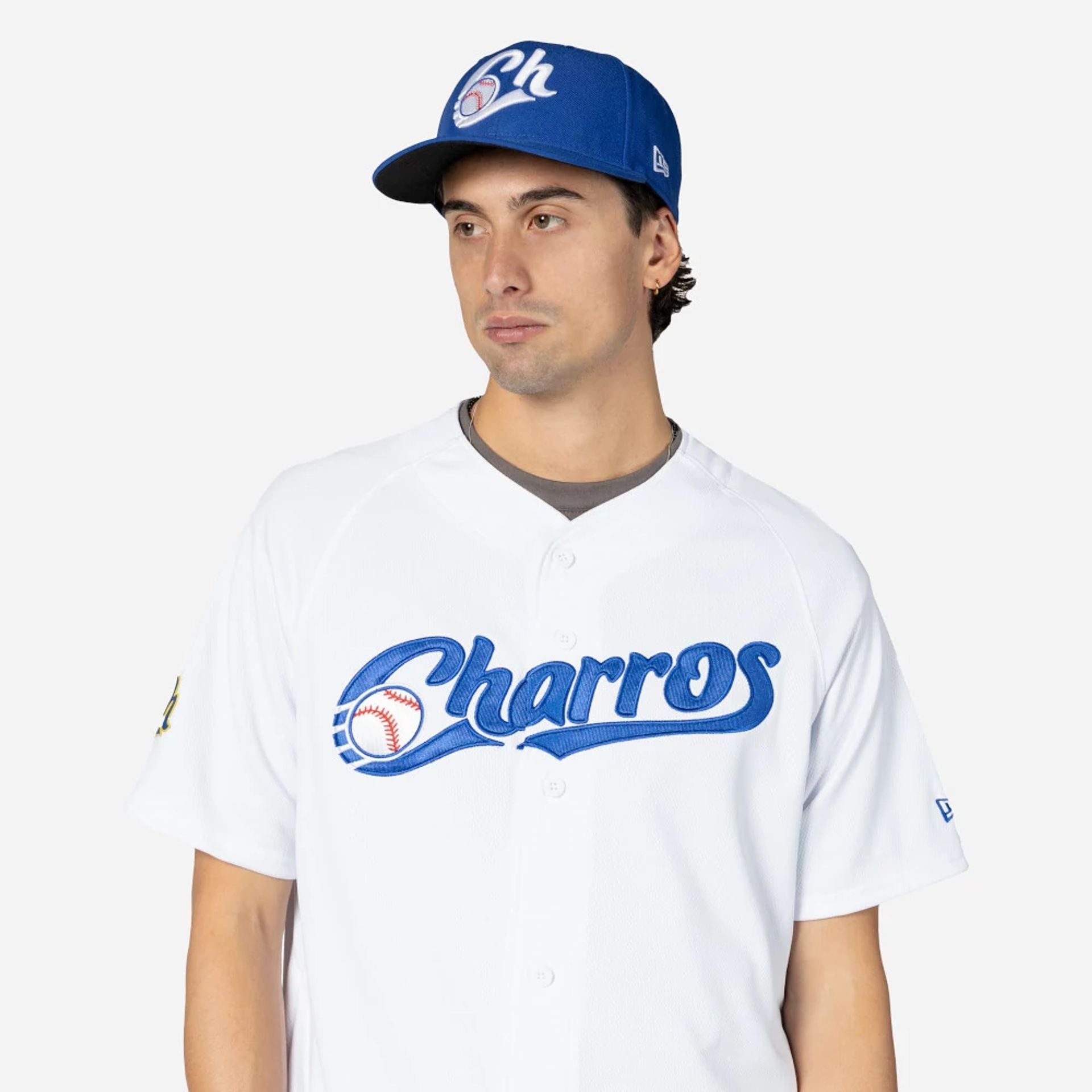 The Male model is wearing Charros De Jalisco Mexico LMB On Field White On-Field Jersey 3