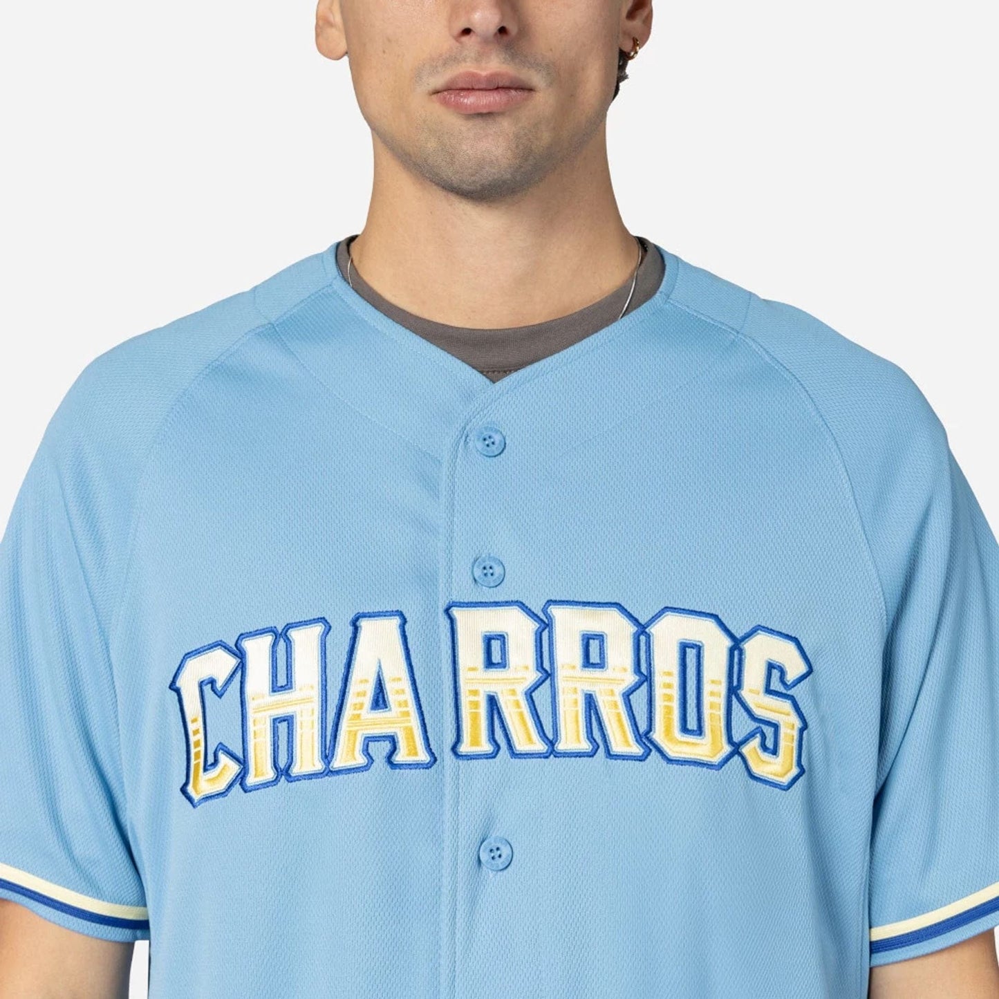 The Male model is wearing Charros De Jalisco Mexico LMB On Field Pastel Blue On-Field Jersey 3