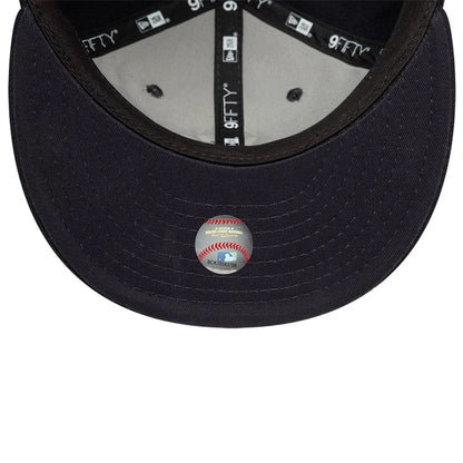 This is a New York Yankees MLB X Saint Mxxxxxx Navy Retro Crown 9FIFTY Snapback Adjustable Cap 7