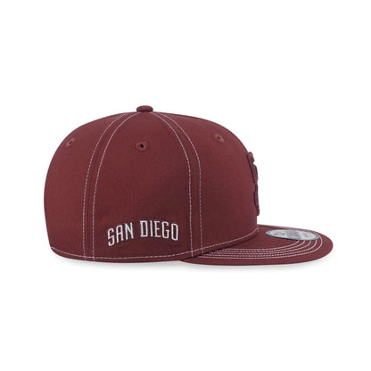 Pictured is this MLB Contrast Stitching San Diego Padres 9FIFTY Snapback cap in brown. 3