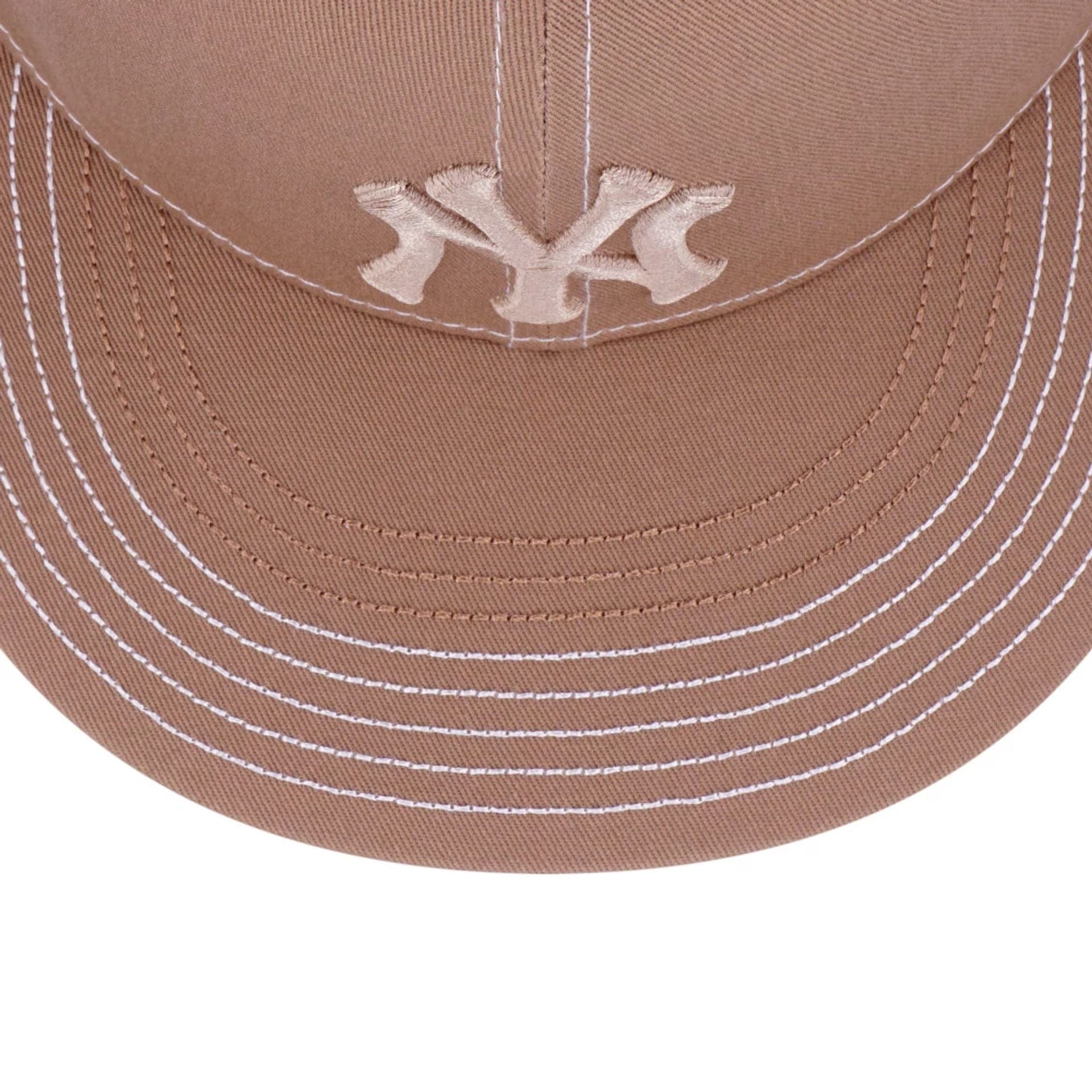 Pictured is this MLB Contrast Stitching New York Yankees 9FIFTY Snapback cap in beige. 4