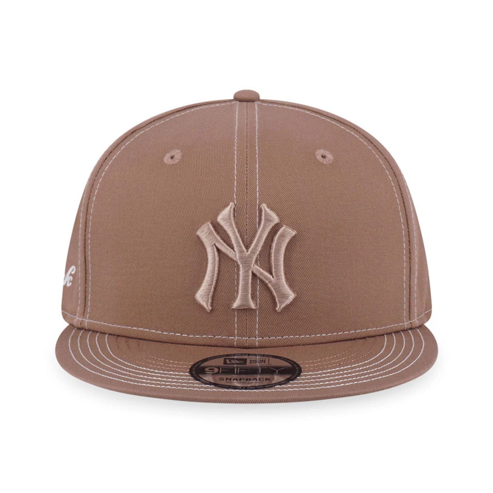Pictured is this MLB Contrast Stitching New York Yankees 9FIFTY Snapback cap in beige. 2