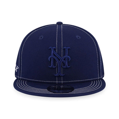 Pictured is this MLB Contrast Stitching New York Mets 9FIFTY Snapback cap in dark blue. 2