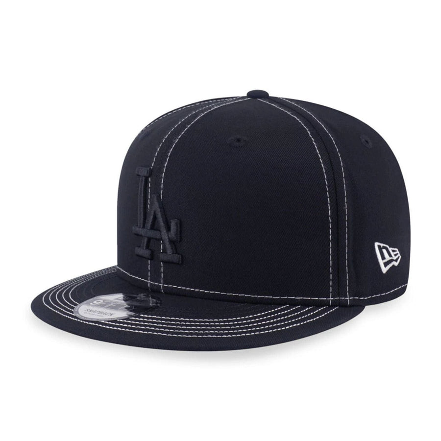 Pictured is this MLB Contrast Stitching LA Dodgers 9FIFTY Snapback cap in black. 1