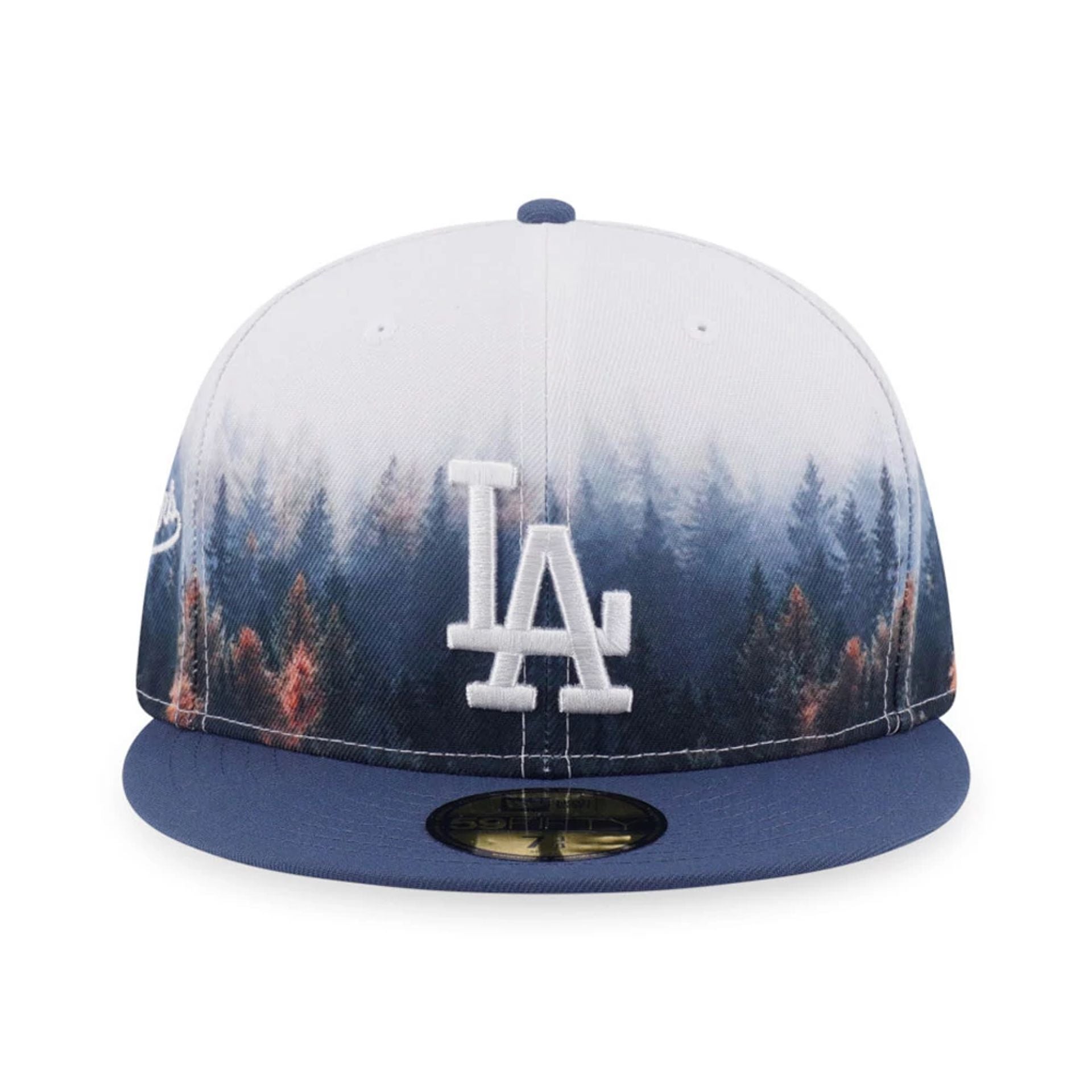 Pictured is this MLB Forest LA Dodgers 59FIFTY Fitted cap in dark blue. 2
