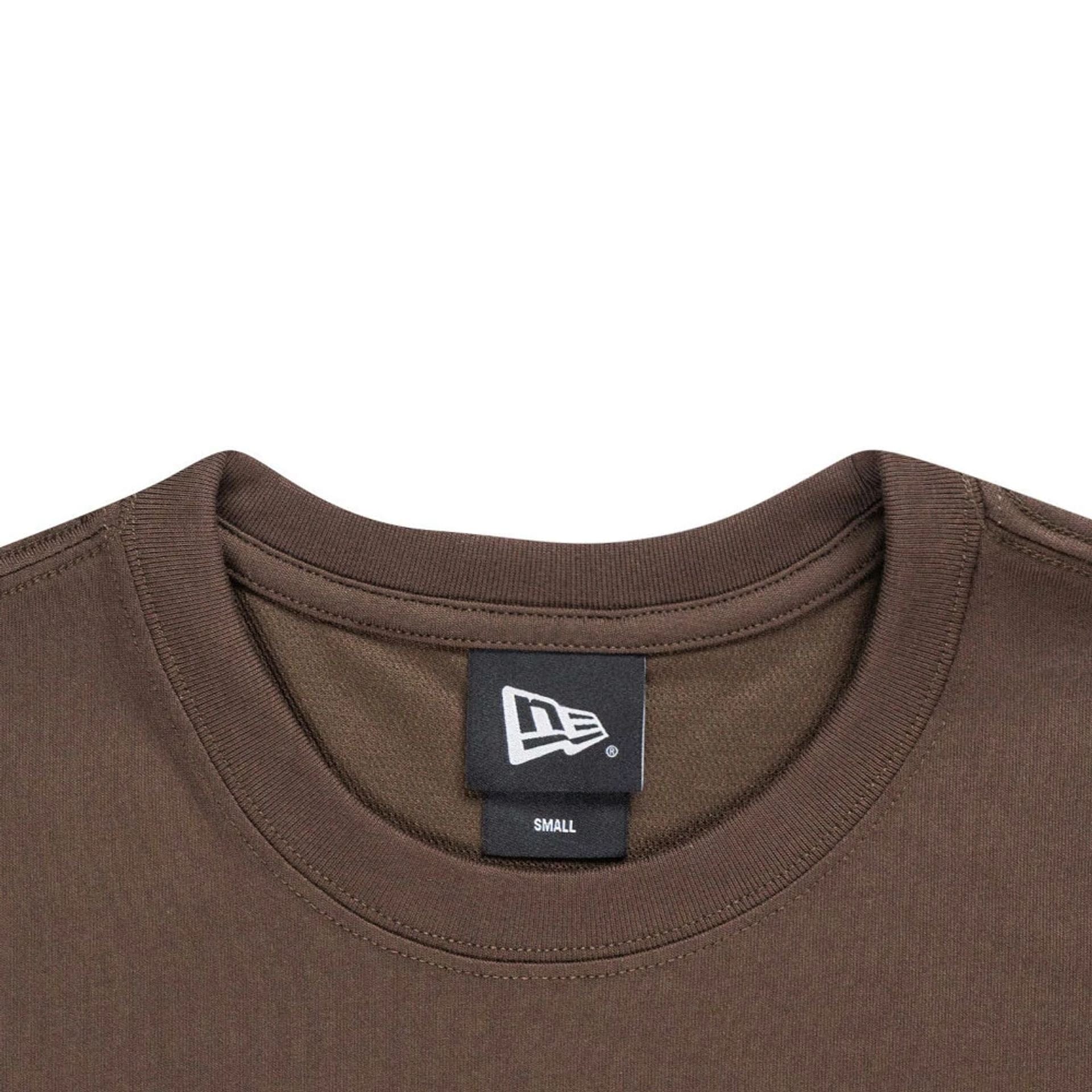 The model is wearing this New Era Year Of The Horse T-Shirt in brown. 5