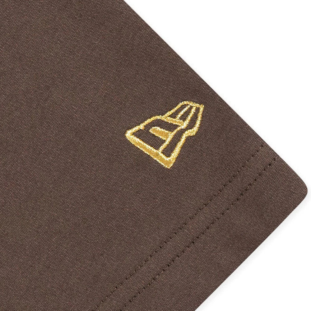 New Era Year Of The Horse Brown T-Shirt, corner view showing the lower brown sleeve with a raised gold New Era logo embroidered towards the hem.