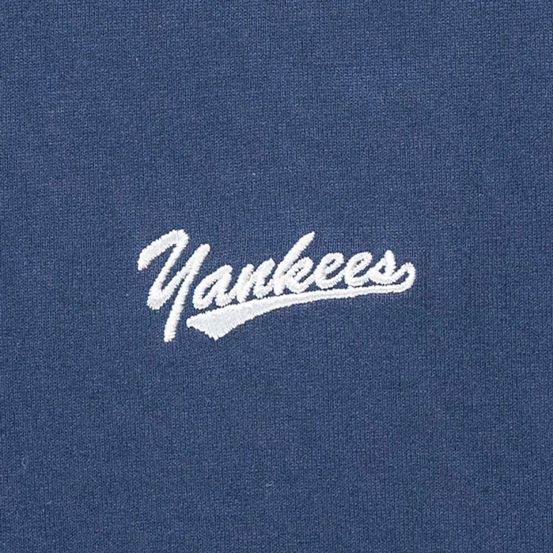 The Male model is wearing New York Yankees MLB Patchwork Blue T-Shirt 3