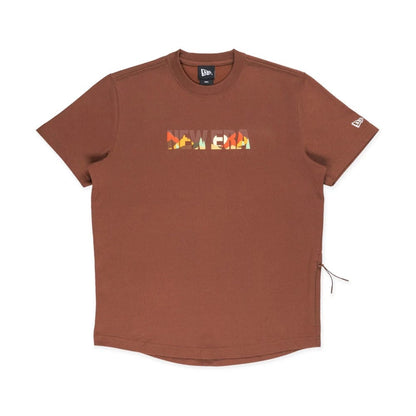 The model is wearing this New Era Mountain Logo T-Shirt in Open Brown. 1