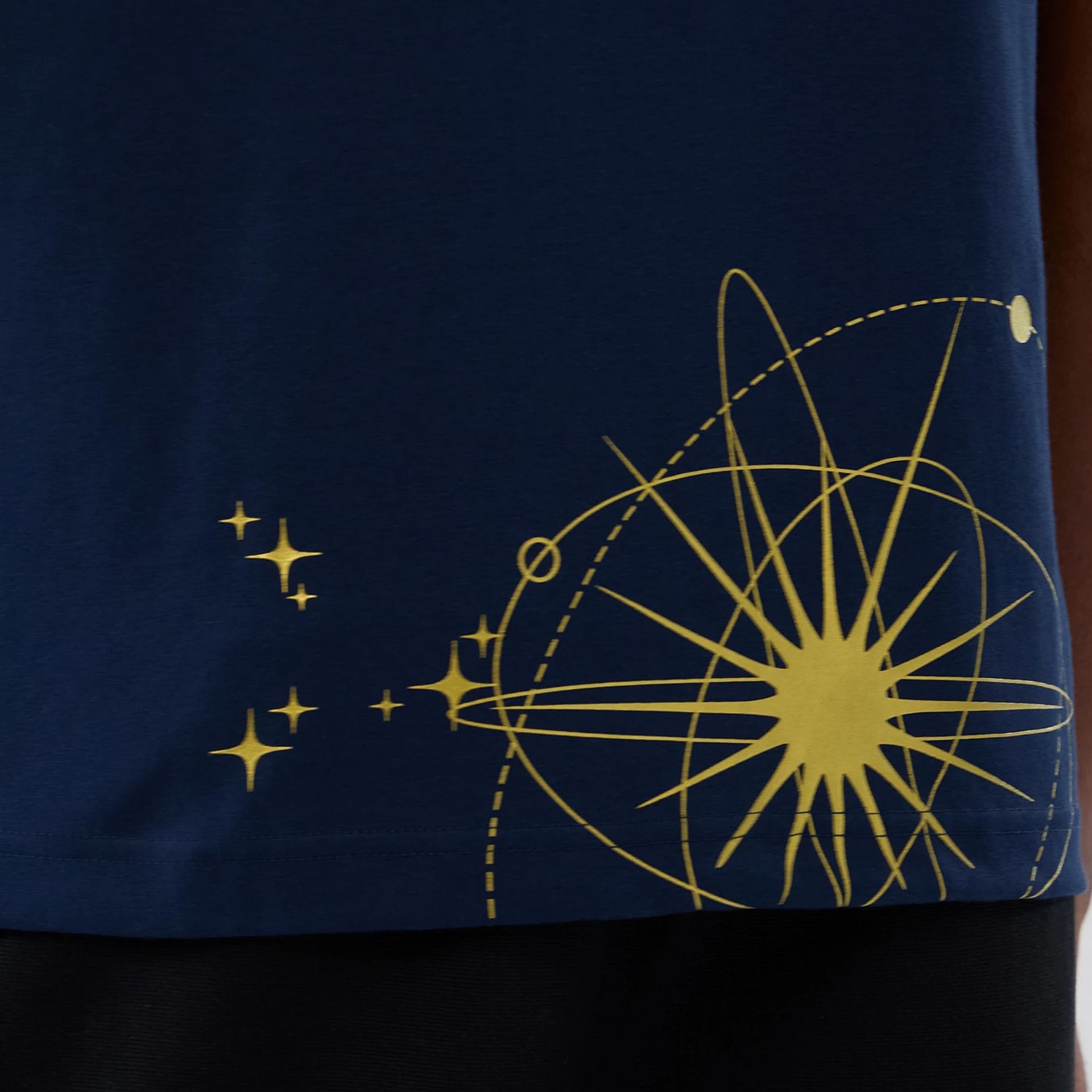 The model is wearing this New Era Cosmic Craft T-Shirt in blue. 6