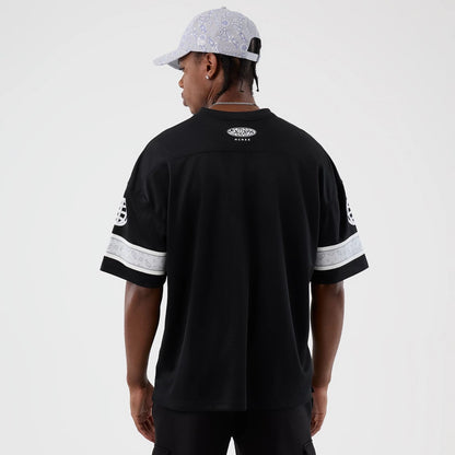 The Male model is wearing  New Era Street Swing Black T-Shirt 2