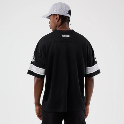 The Male model is wearing  New Era Street Swing Black T-Shirt 2