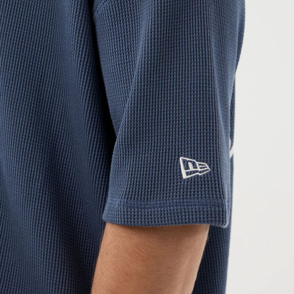 The Male model is wearing New Era Basic Blue T-Shirt 4