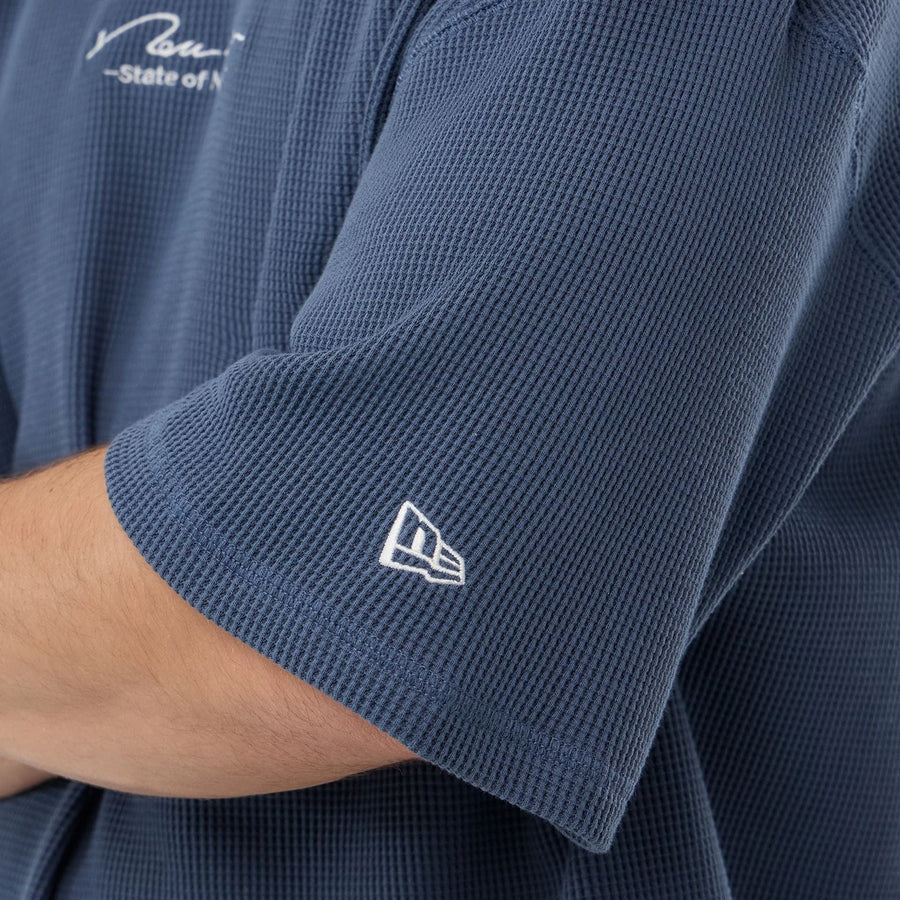 The Male model is wearing New Era Basic Blue T-Shirt 7