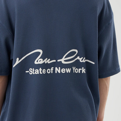 The Male model is wearing New Era Basic Blue T-Shirt 3