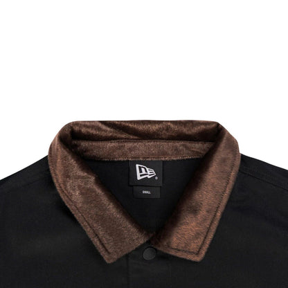 The model is wearing this New Era Year Of The Horse Jacket in black. 4