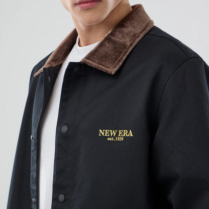 The model is wearing this New Era Year Of The Horse Jacket in black. 4