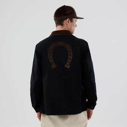 The model is wearing this New Era Year Of The Horse Jacket in black. 2