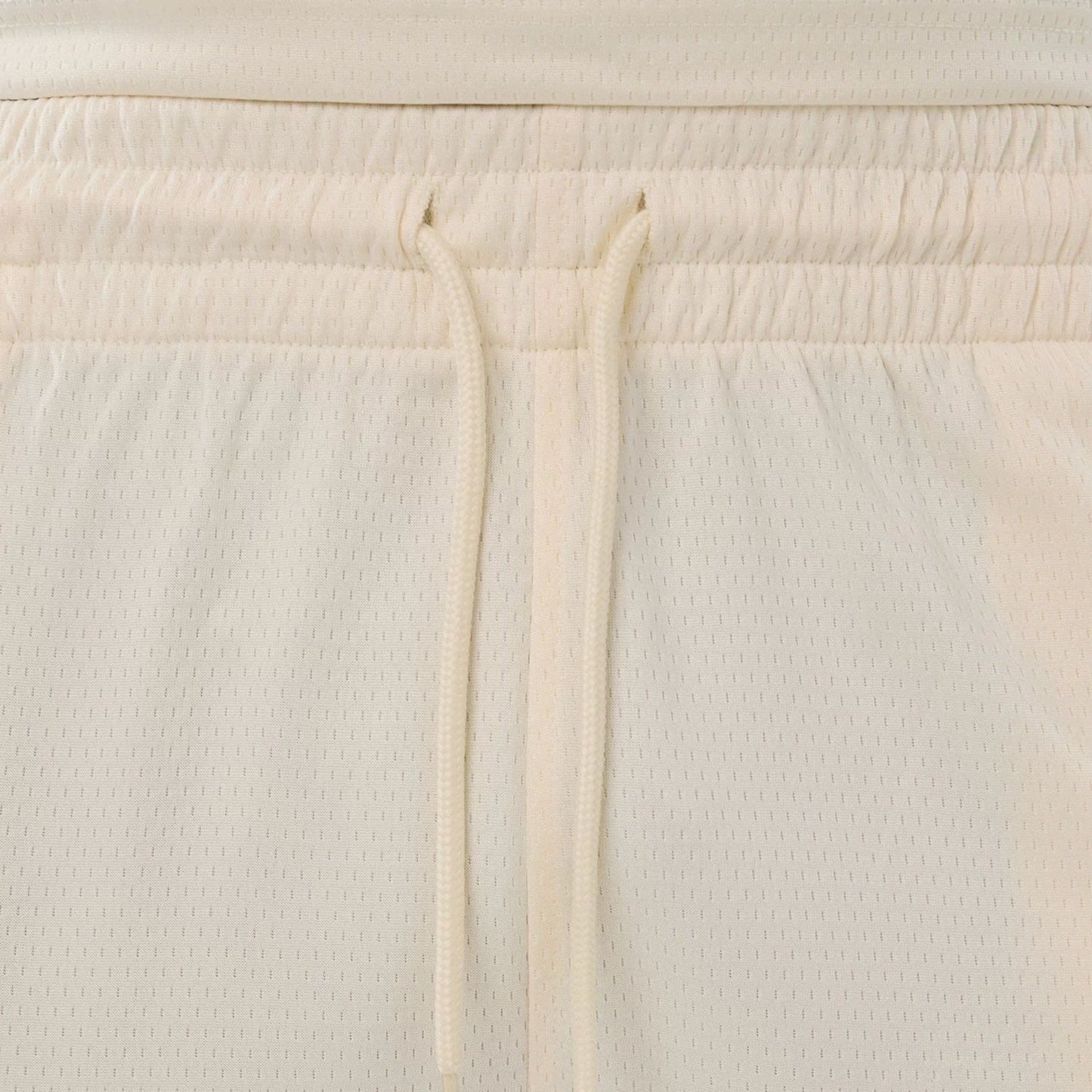 The model is wearing these NFL Historic Las Vegas Raiders shorts in cream. 6