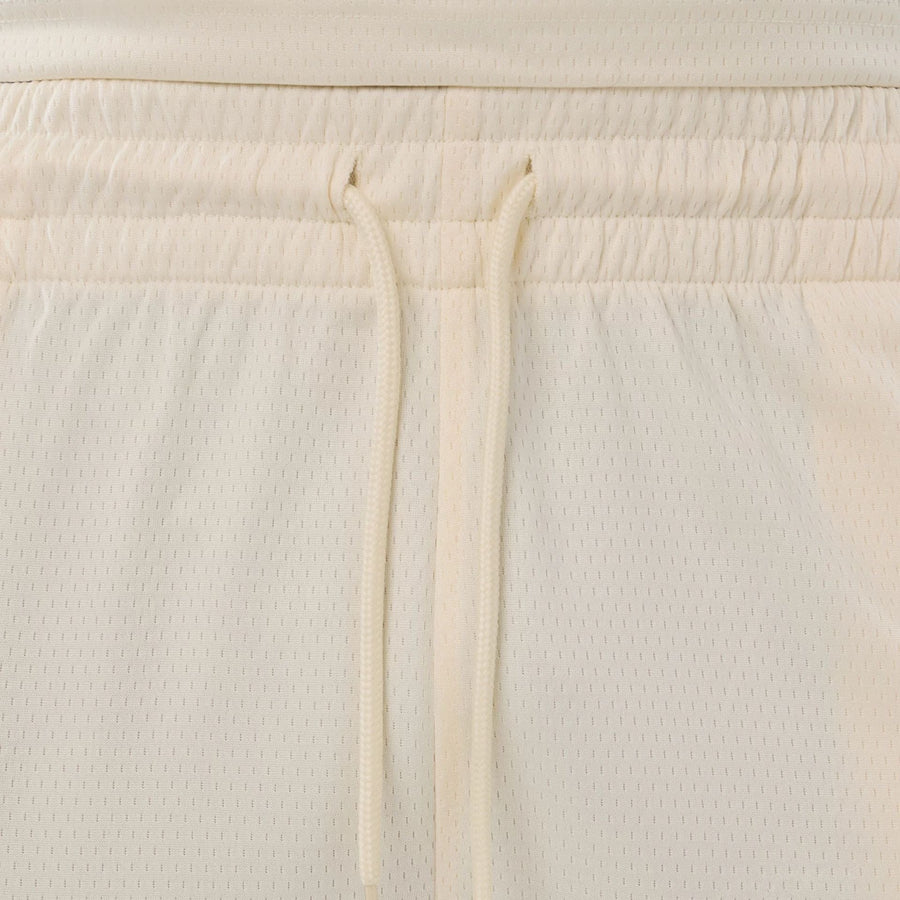 The model is wearing these NFL Historic Las Vegas Raiders shorts in cream. 6