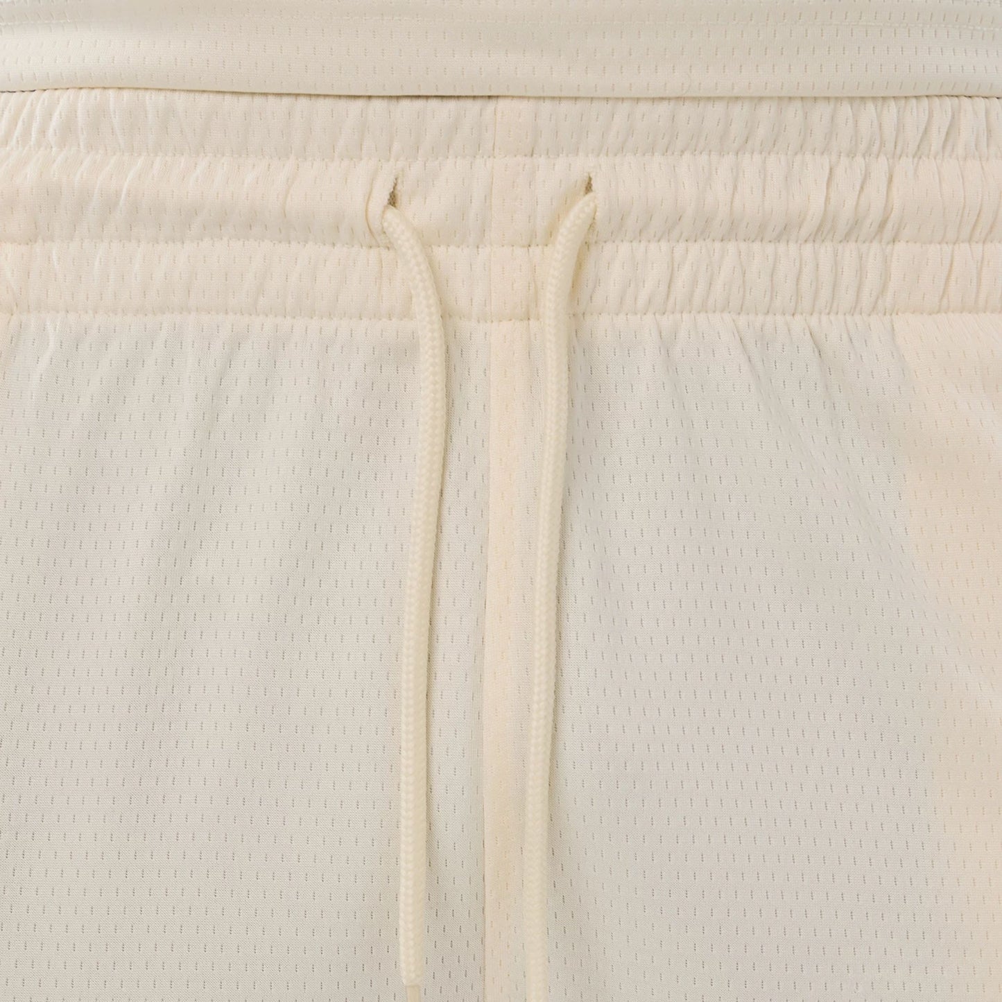 The model is wearing these NFL Historic Las Vegas Raiders shorts in cream. 6
