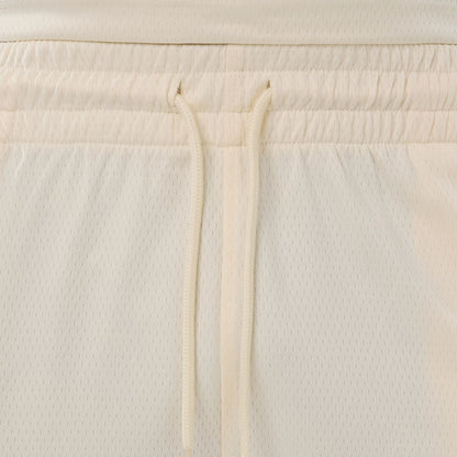 The model is wearing these NFL Historic Las Vegas Raiders shorts in cream. 6