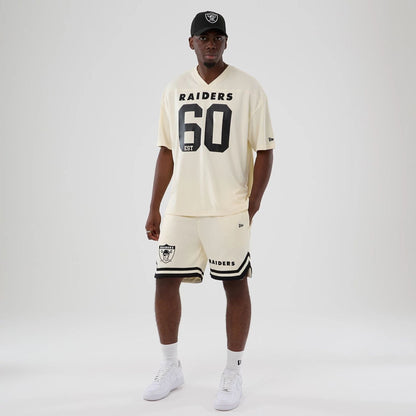 The model is wearing these NFL Historic Las Vegas Raiders shorts in cream. 8