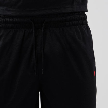 The model is wearing these NFL Historic Kansas City Chiefs shorts in black. 6